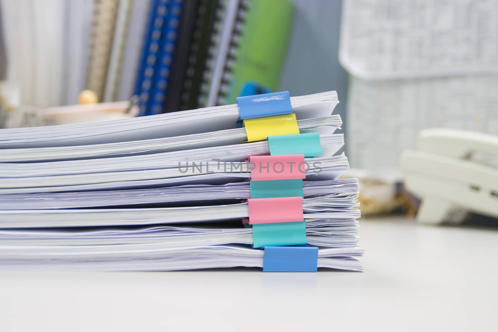 file folder and Stack of business report paper file on the table in a work office, concept document in work office
