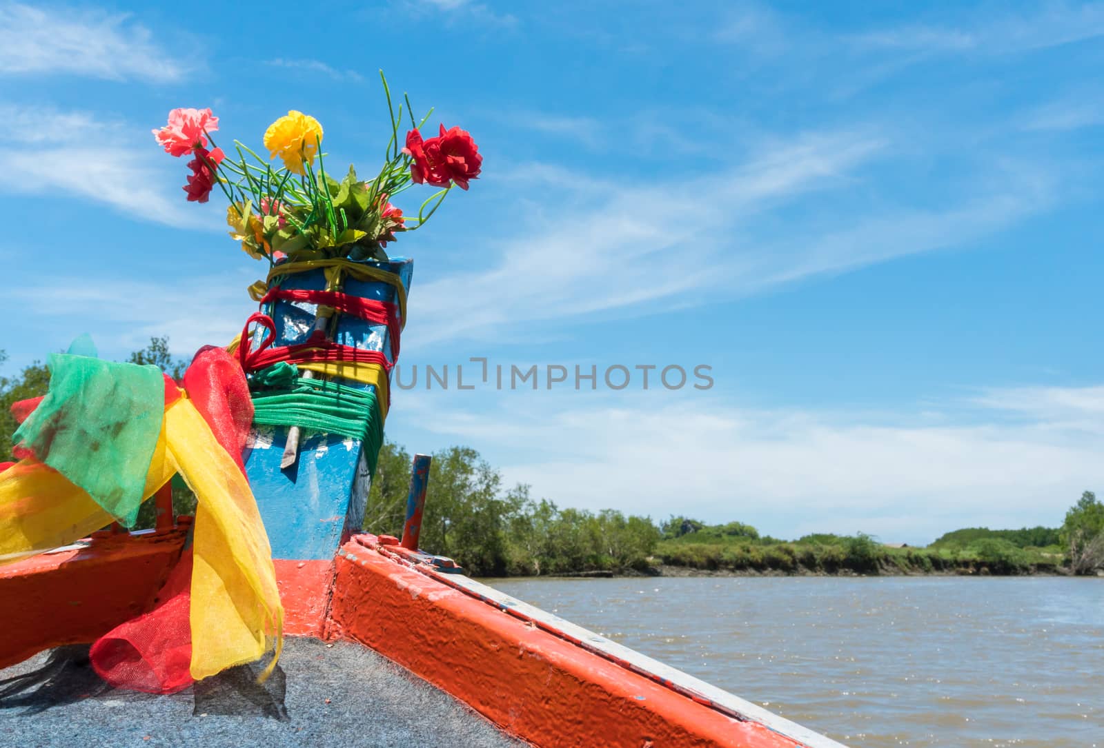 Khao Daeng canal boat trip at Prachuap Khiri Khan Thailand. Boat or fishing boat with blue sky and cloud and green tree and water. Landscape or scenery summer concept for boat trip