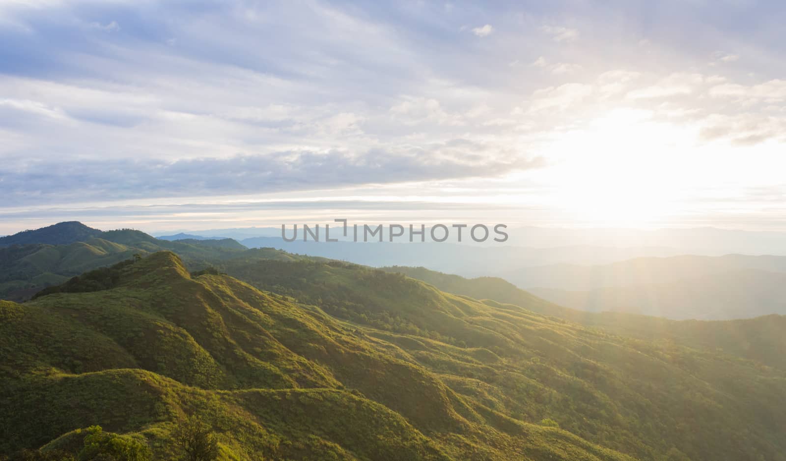 Landscape Phu Langka Mountain National Park Phayao Thailand Travel Wide. Green tree mountain and cloud sky and warm sun light at Phu Langka national park view point 
Phayao Thailand. Northern Thailand travel