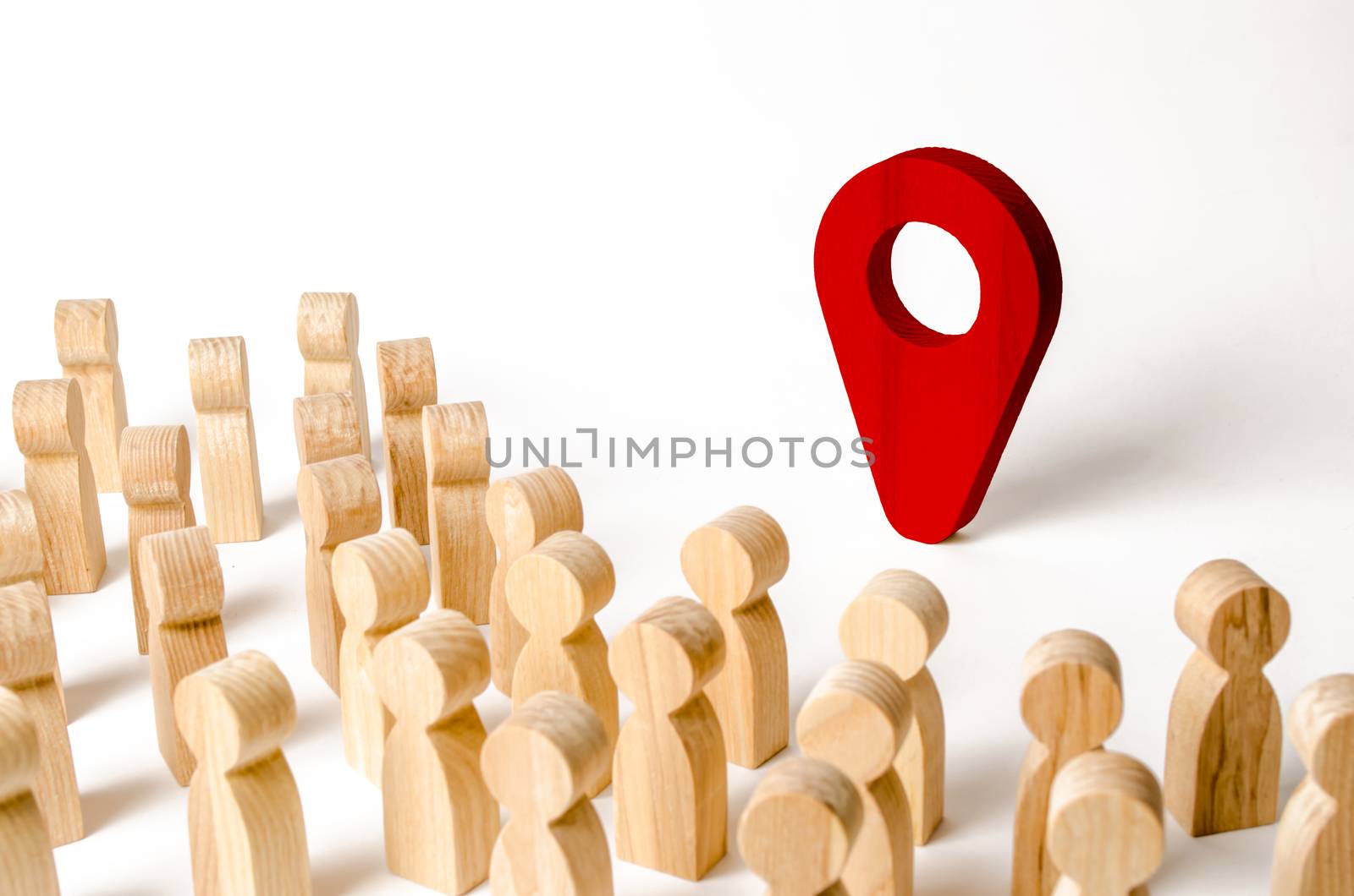 People are standing near the location marker. Concept of navigation and venue. Tourism and travel. Spying on the citizens.. Orientation around the city, the location of events and events.