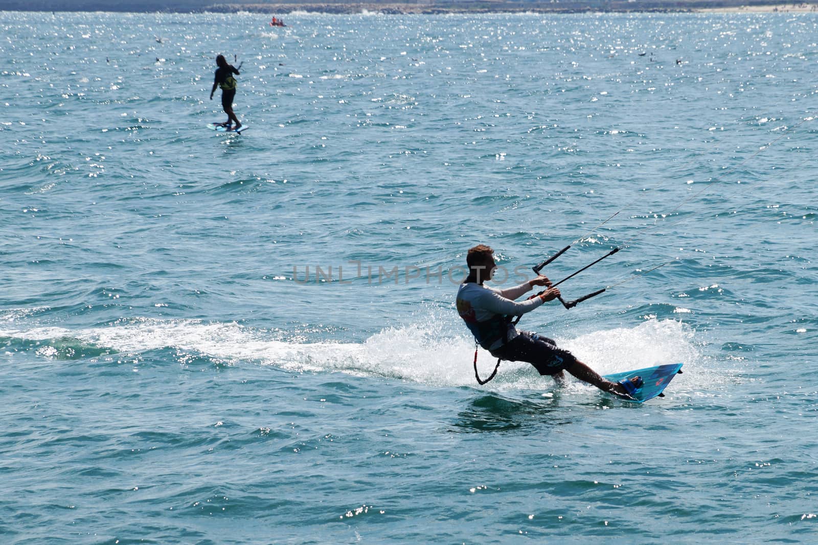 Varna, Bulgaria - July, 19, 2020 men is kiting the sea