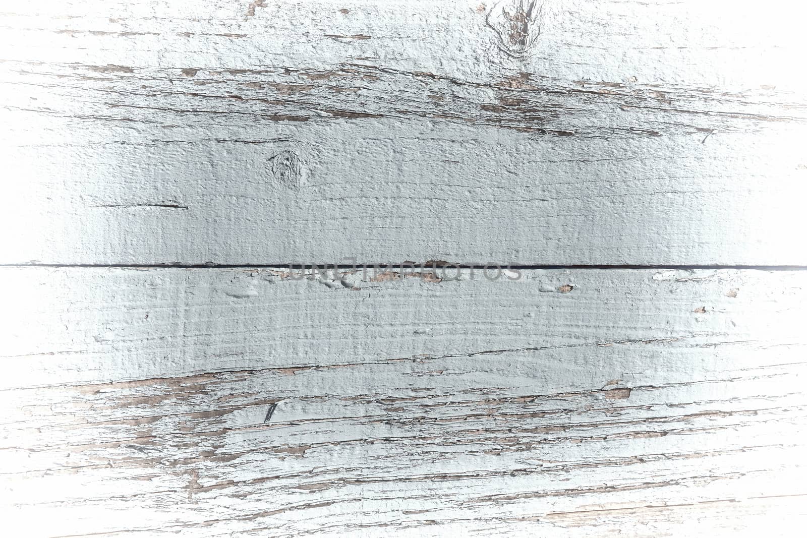 Old blue weathered distressed wood oak plank board texture background with white vignette stock photo