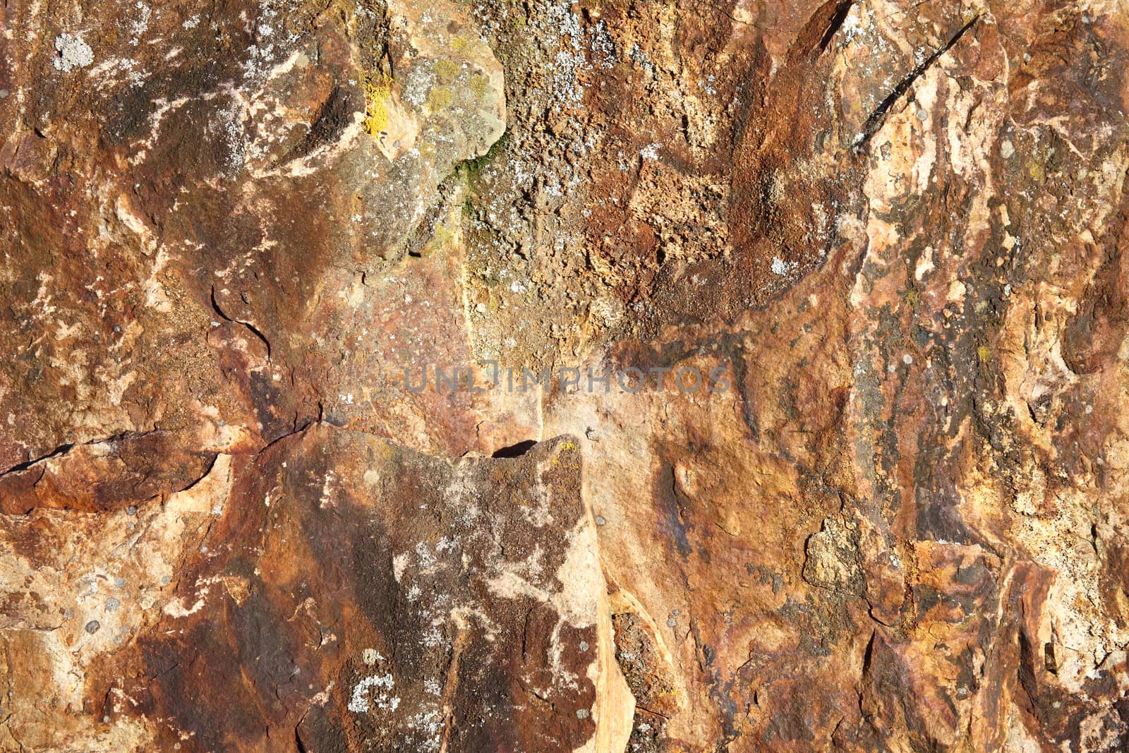 Stone weathered brown surface texture background of rough rock stock photo