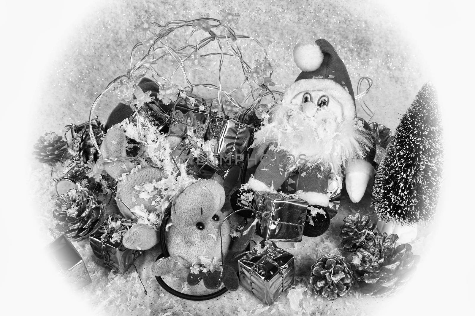Father Christmas and Rudolph collapsed exhausted during the Christmas festival black and white monochrome image stock photo