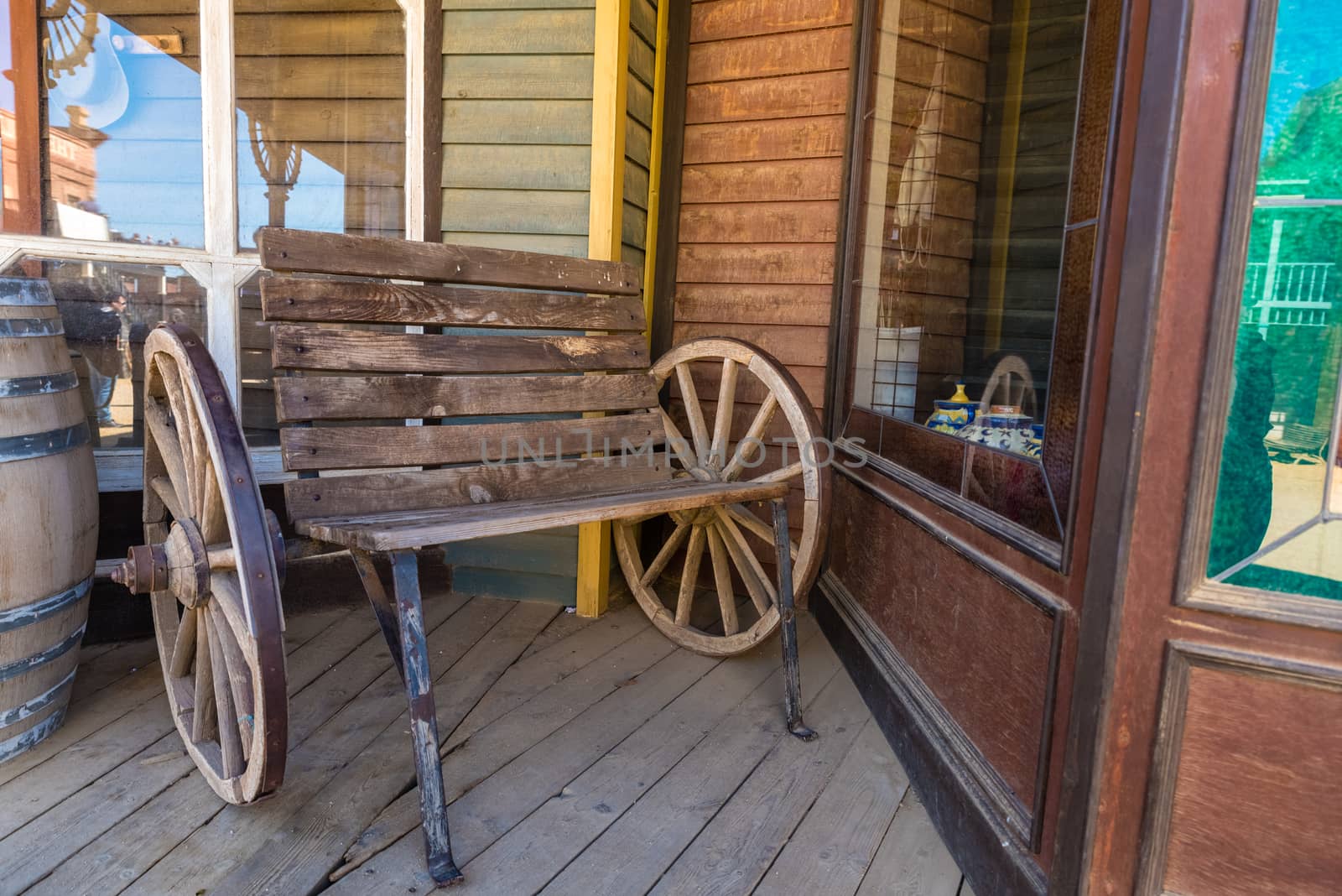 old wooden bench with wheels