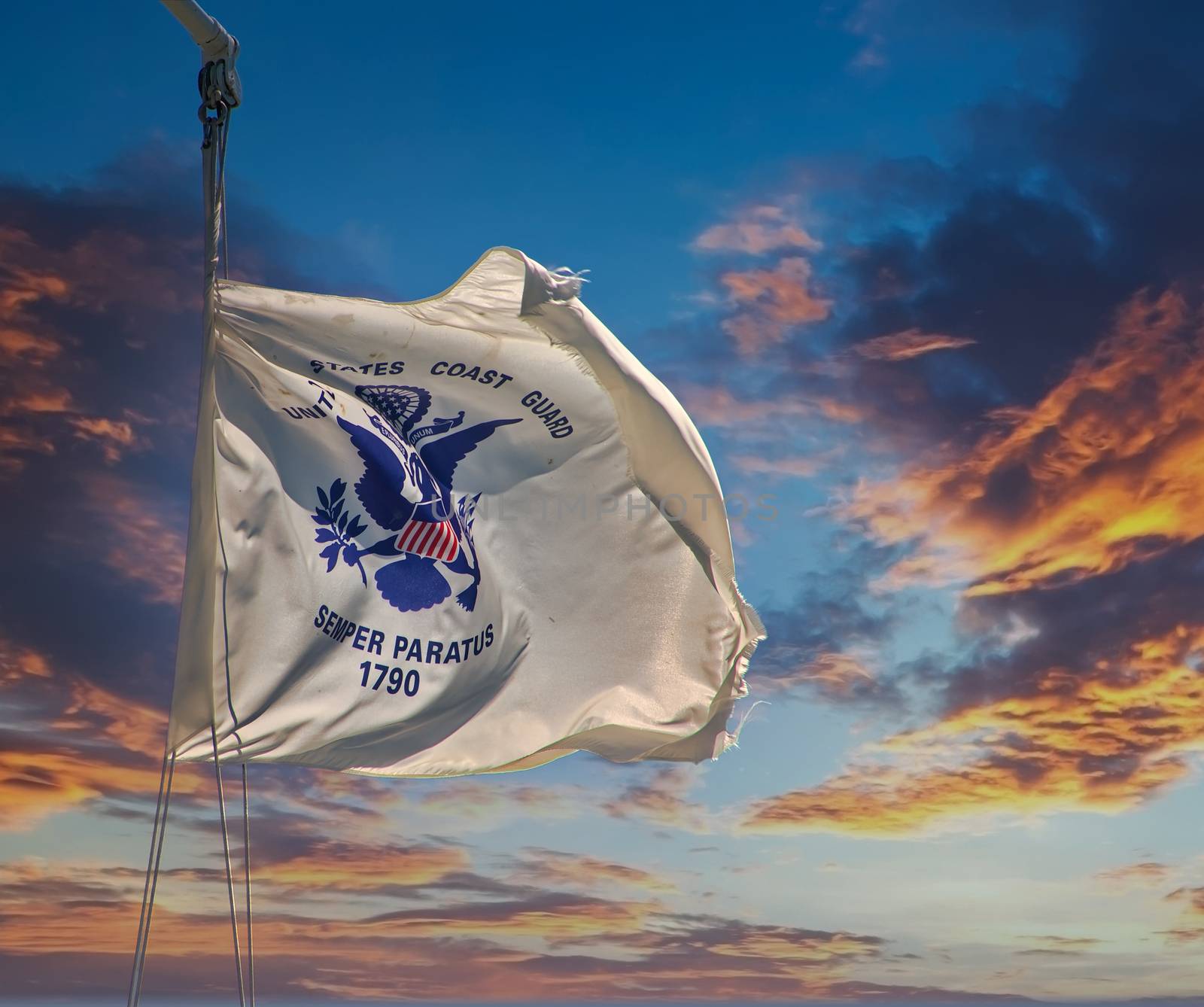 Coast Guard Flag on Sunset by dbvirago