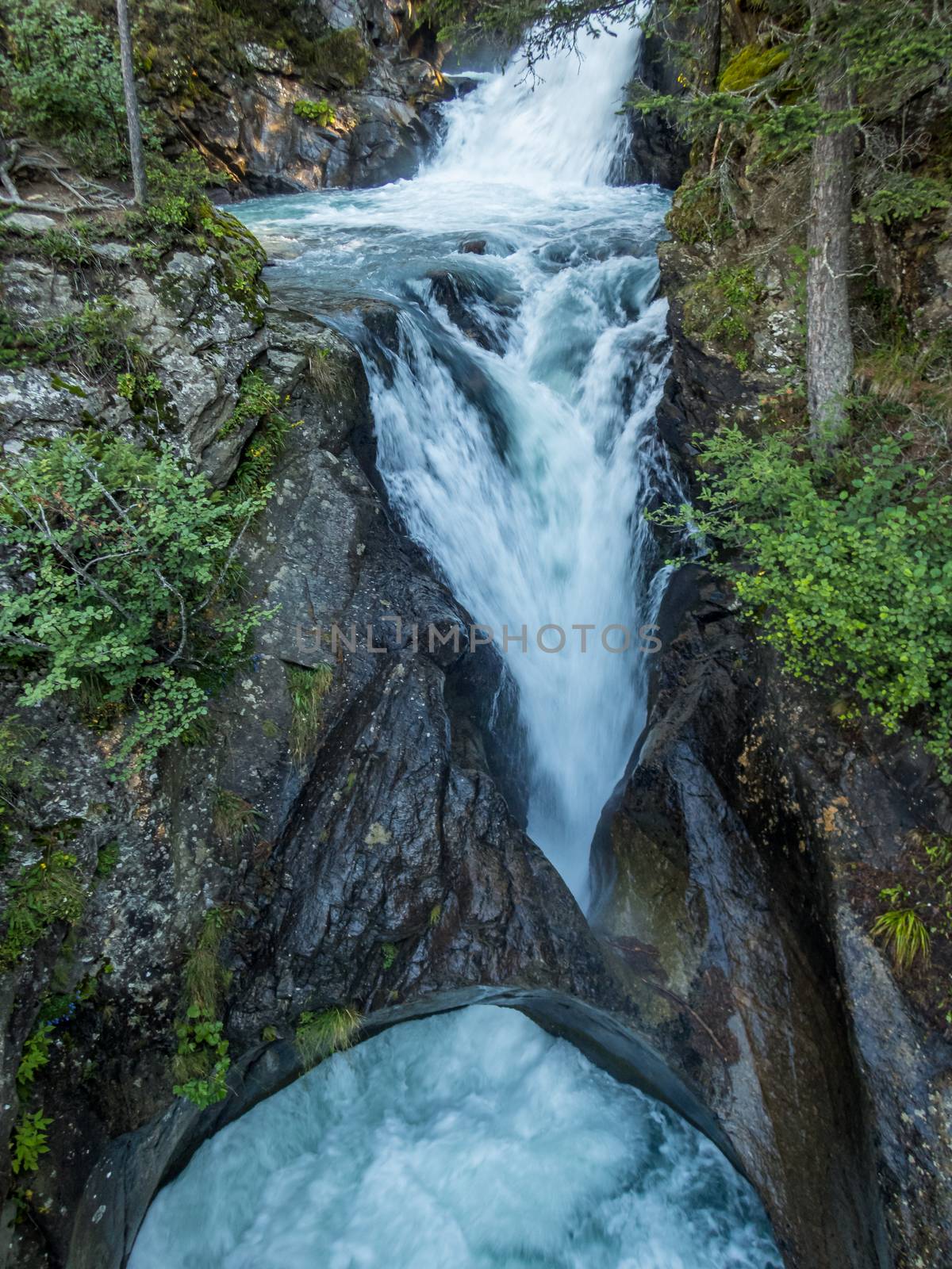 Climbing on the Stuibenfall via ferrata near Umhausen in the Otztal, Tyrol, Austria