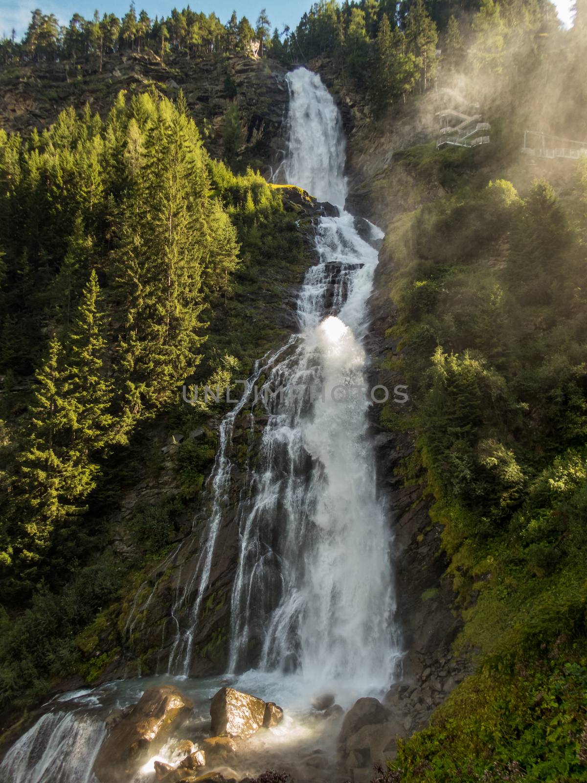 Climbing on the Stuibenfall via ferrata near Umhausen in the Otztal, Tyrol, Austria