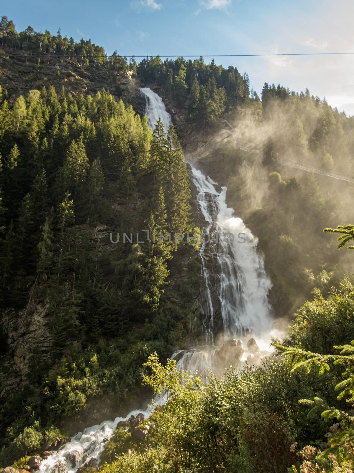 Climbing on the Stuibenfall via ferrata near Umhausen in the Otztal, Tyrol, Austria