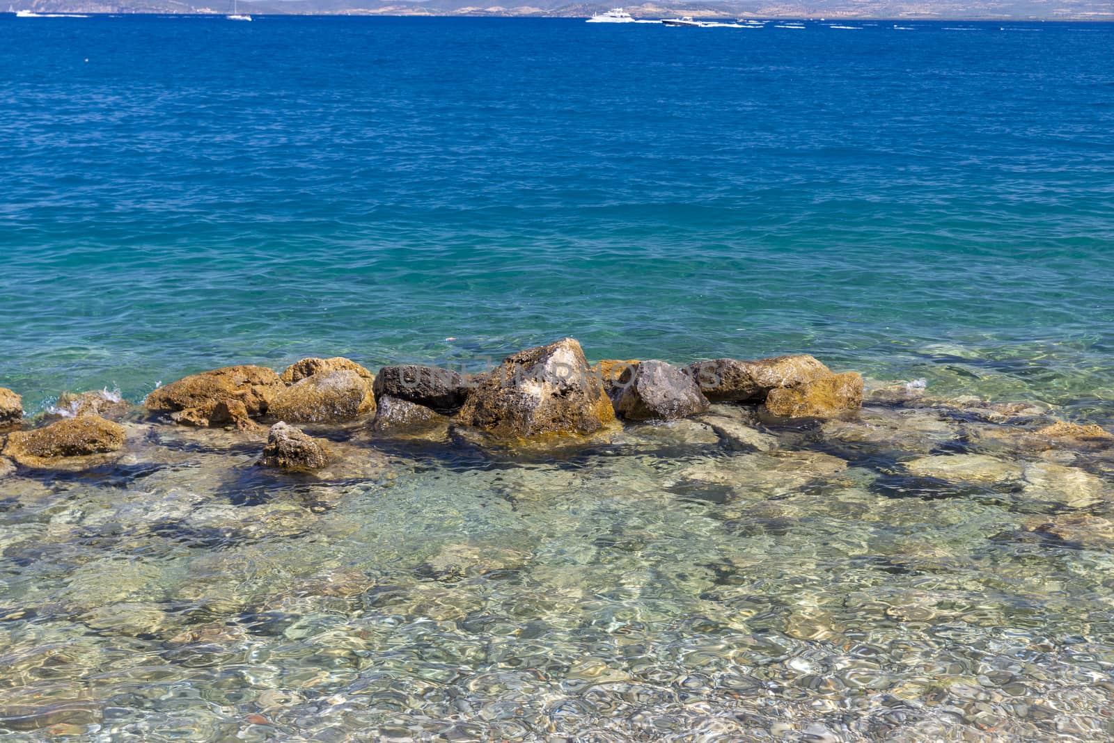 porto santo stefano,italy july 25 2020:rocks in the middle of the sea in porto santo stefano