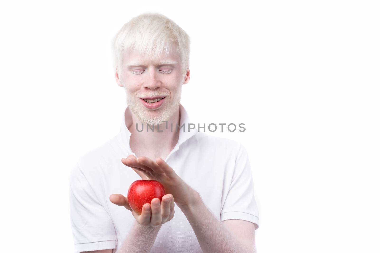 portrait of an albino man in studio dressed t-shirt isolated on a white background. abnormal deviations. unusual appearance by andreonegin