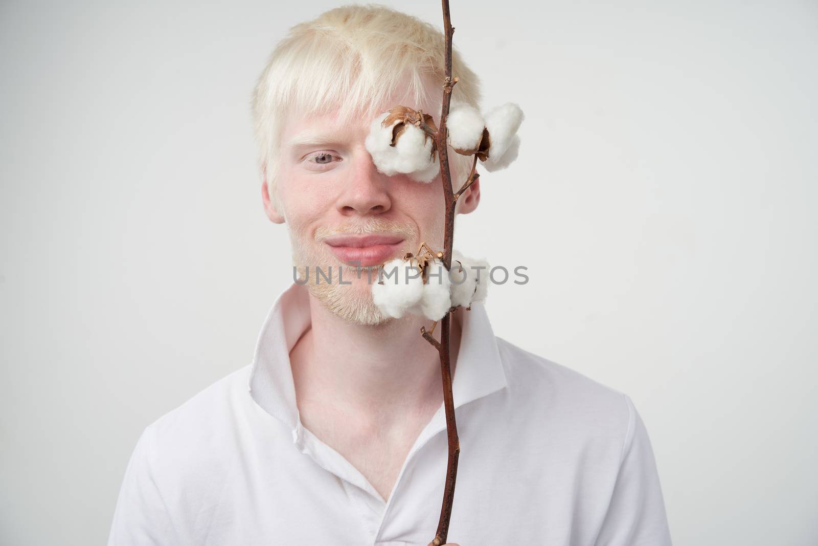 albinism Happy smile albino man white skin hair soft fluffy cotton brunch studio dressed t-shirt isolated white background abnormal deviations unusual appearance abnormality Beautiful people
