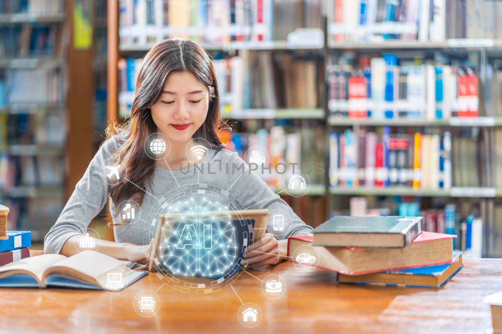 Polygonal brain shape of an artificial intelligence with various icon of smart city Internet of Things Technology over Asian young Student using technology tablet in library of university