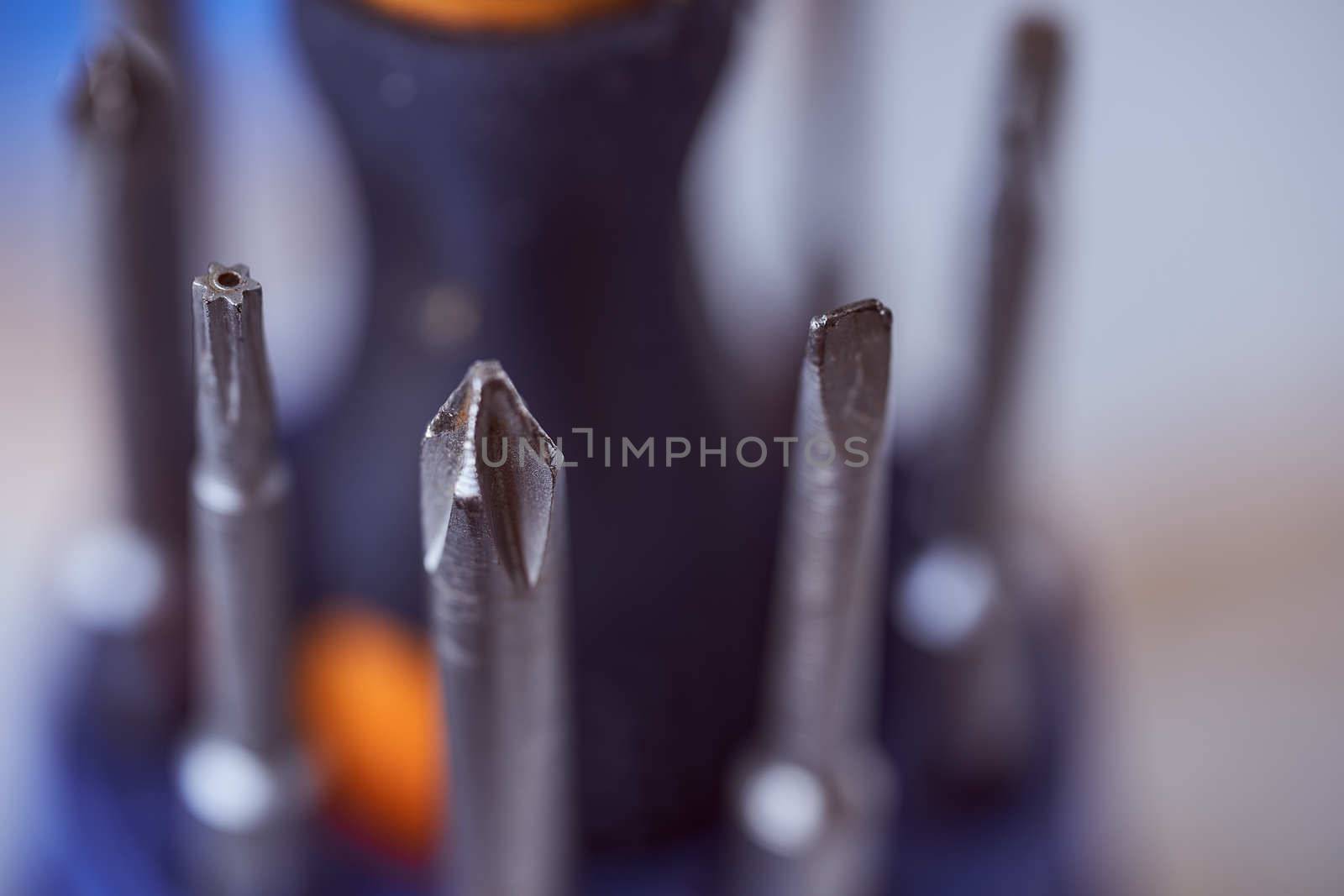 set of screwdrivers on blue blurred background. Close-up. High quality photo