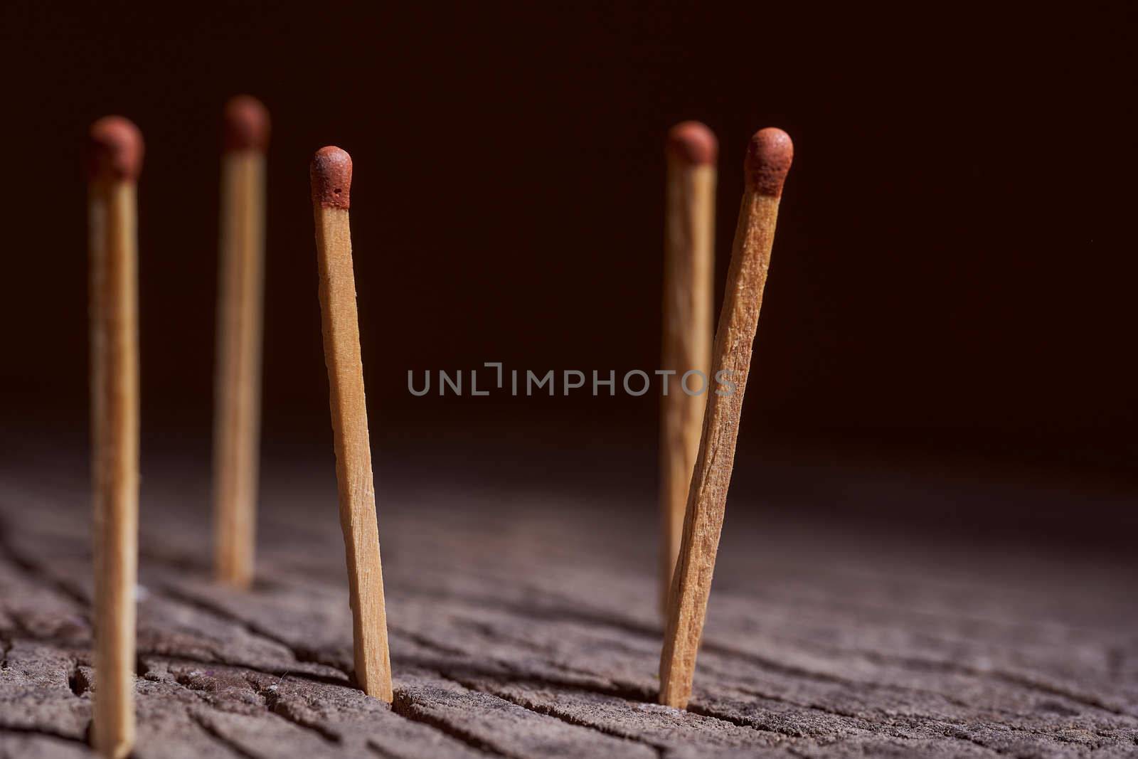 wooden matches are on the wooden frame. Concept photo. High quality photo