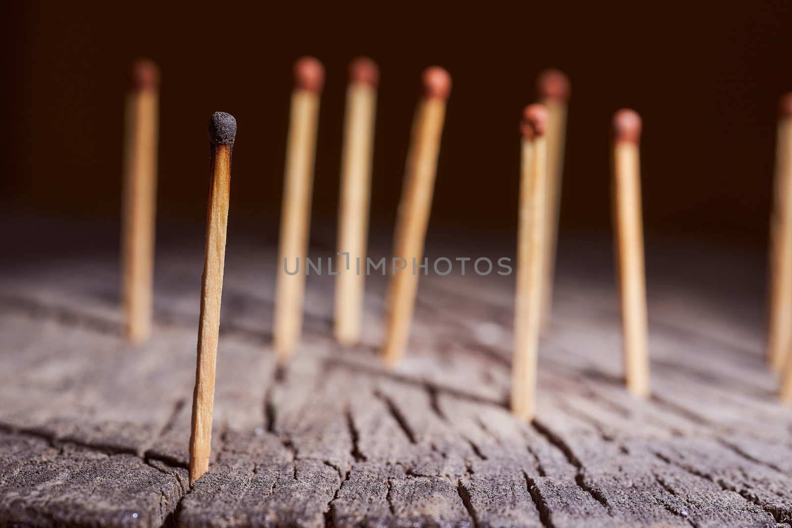 wooden matches are on the wooden frame. Concept photo. High quality photo