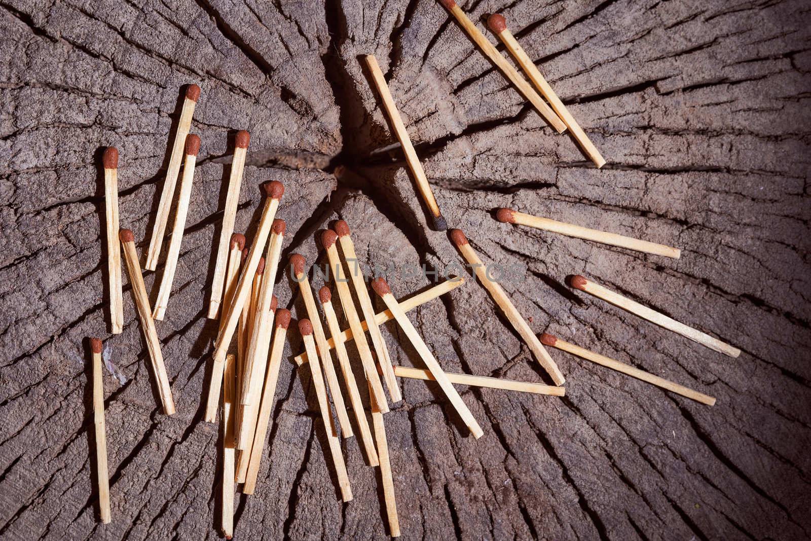 wooden matches lie on the wooden frame. High quality photo