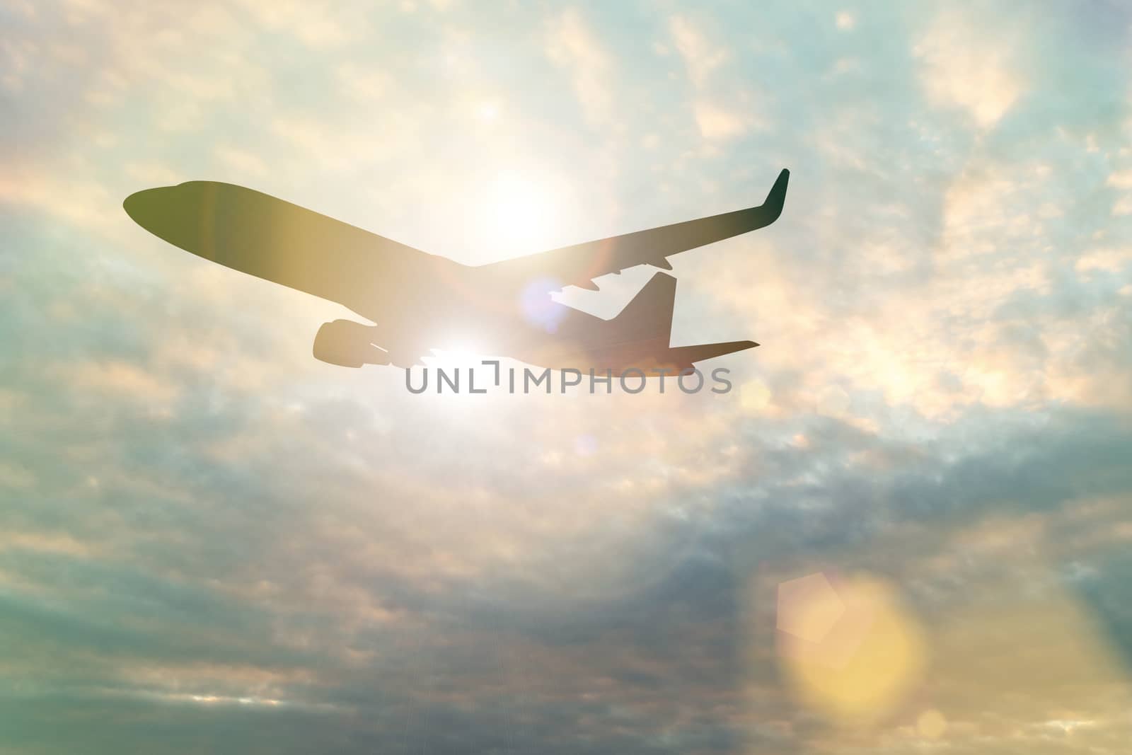 Silhouette of Airplane take off on the Beautiful Blue sky with clouds and sun.