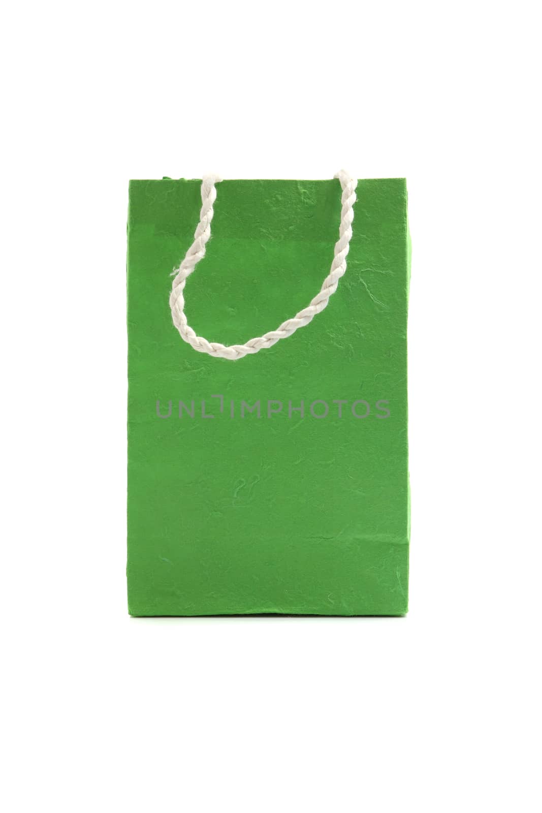 Green paper bag isolated in white background