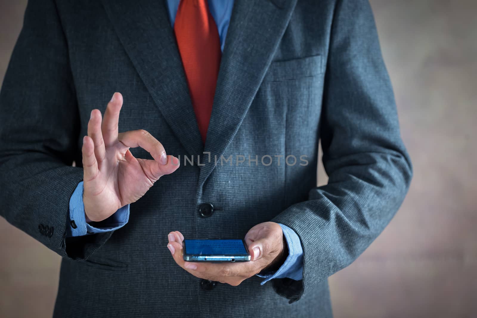 Businessman working on a virtual screen of the future. Businessm by kaiskynet