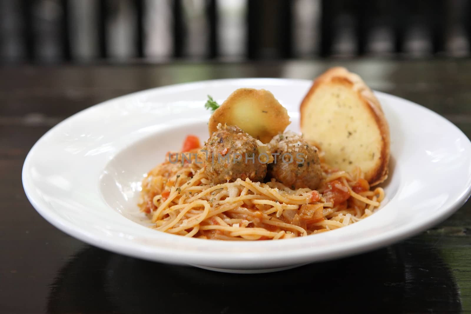 Spaghetti  Meatballs on wood background