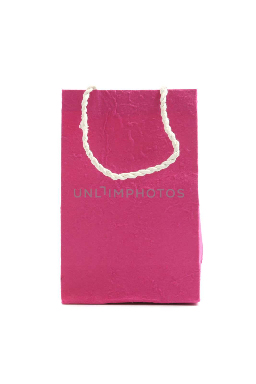 Pink paper bag isolated in white background