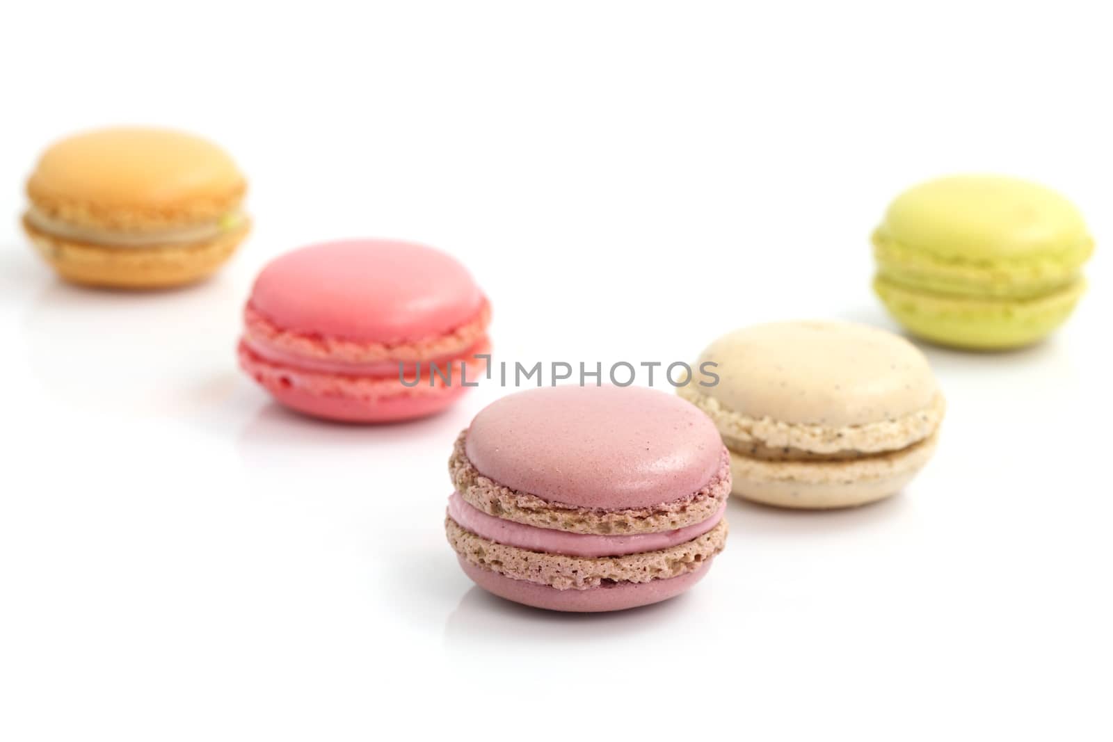 Colorful Macaron in close up isolated on white background