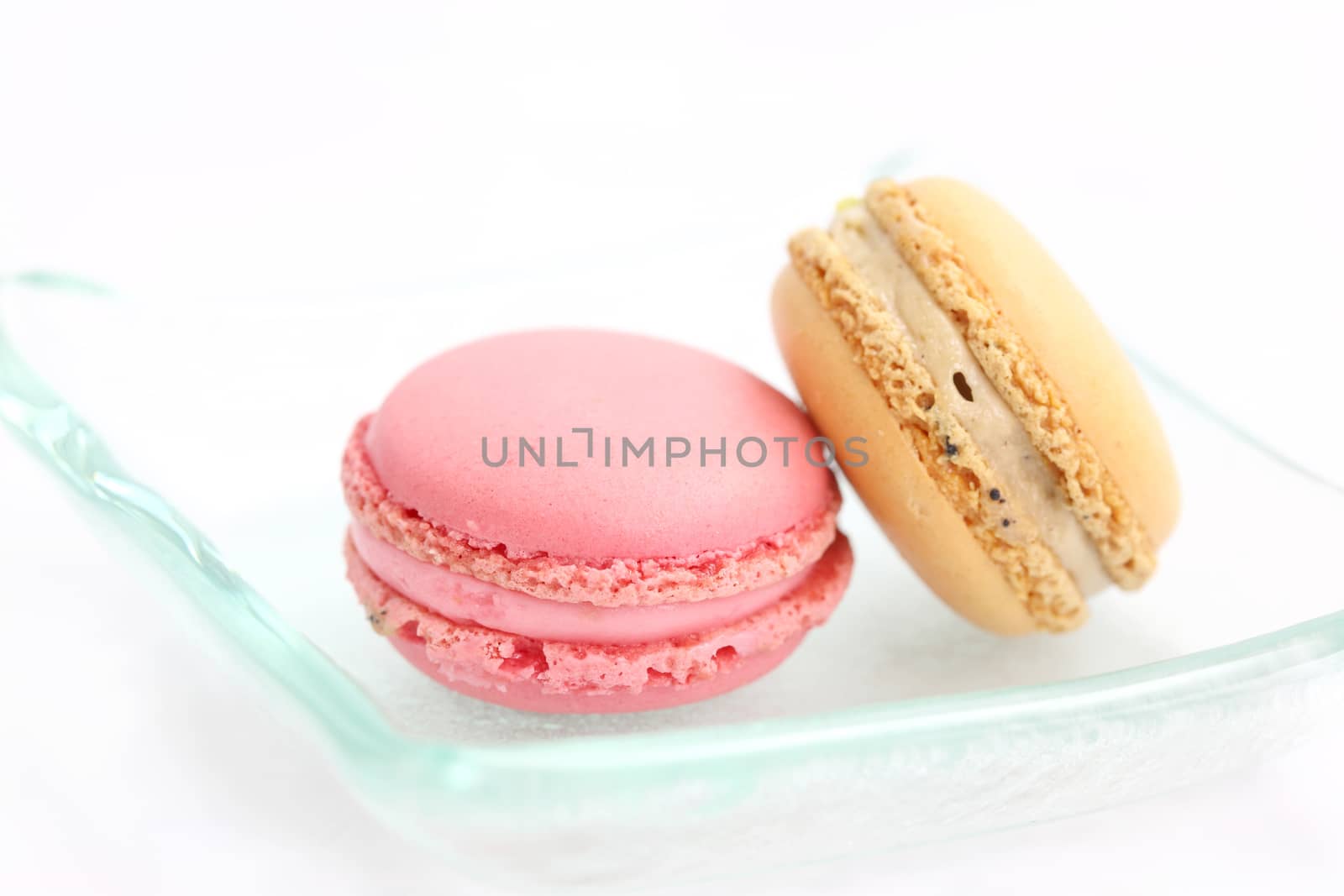 Colorful Macaron in close up isolated on white background