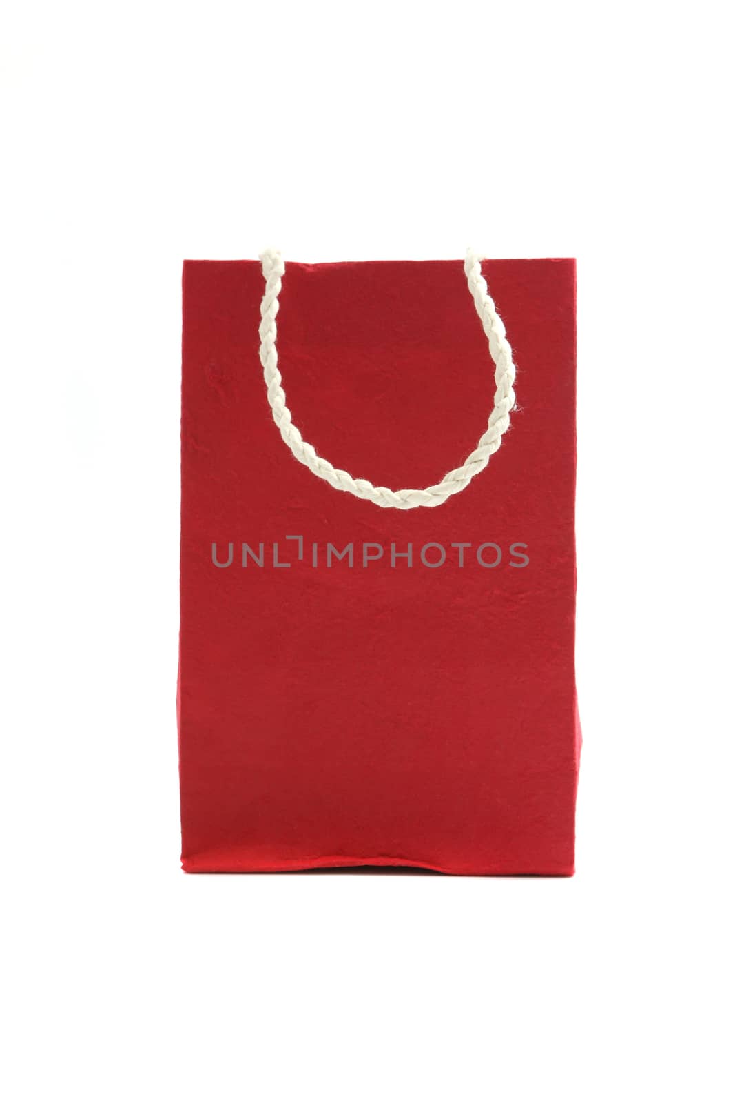 Red paper bag isolated in white background