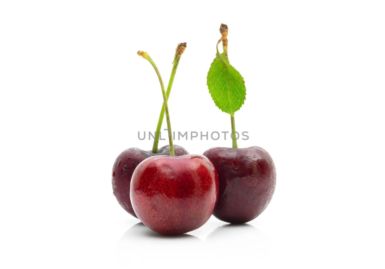 Cherry fruit on a white background by sompongtom