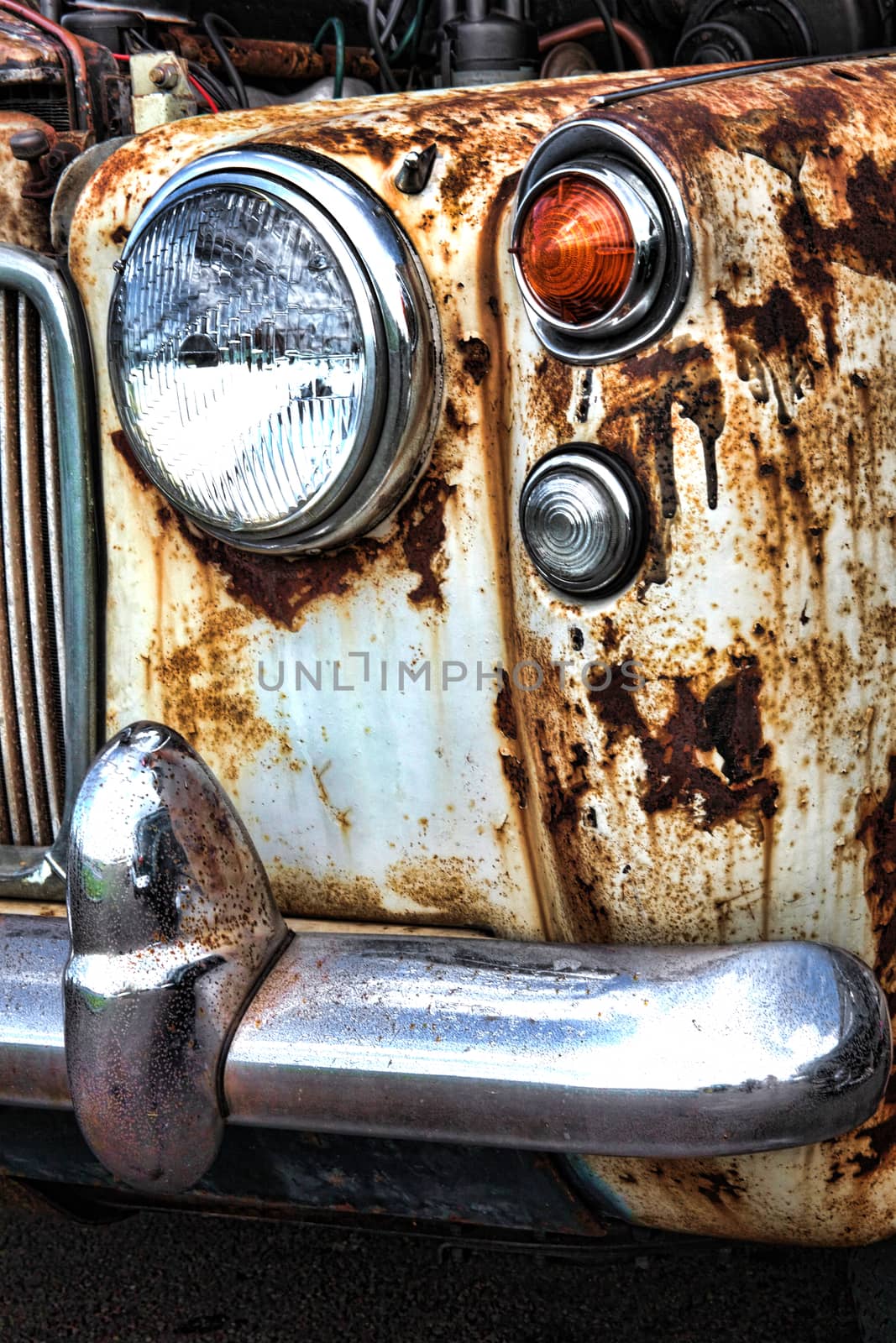 Old rusty vintage classic collectors car in need of restoration stock photo