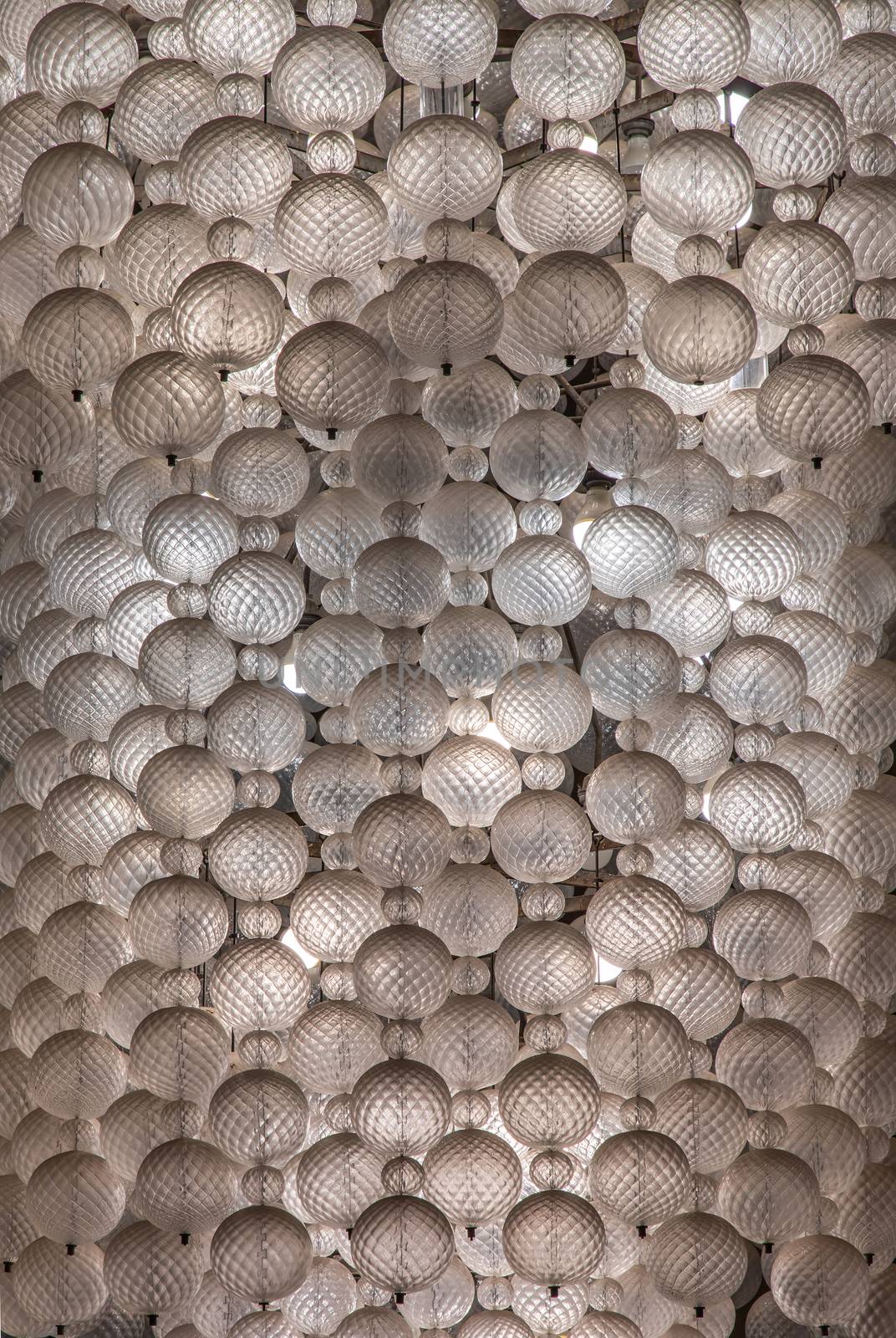 Close-up shot of White gorgeous vintage chandelier decoration.