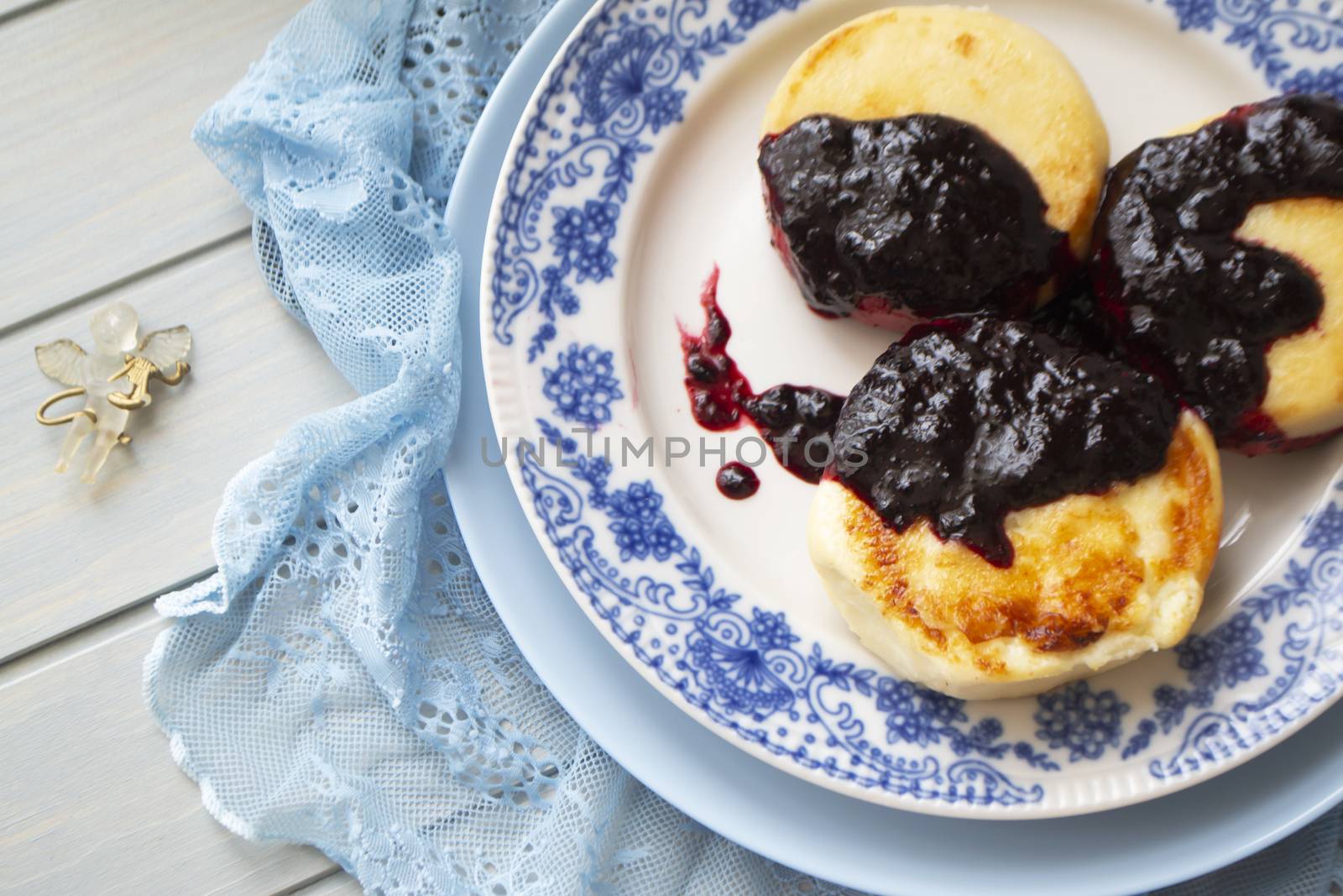cheesecakes or pancakes from cottage cheese with jam