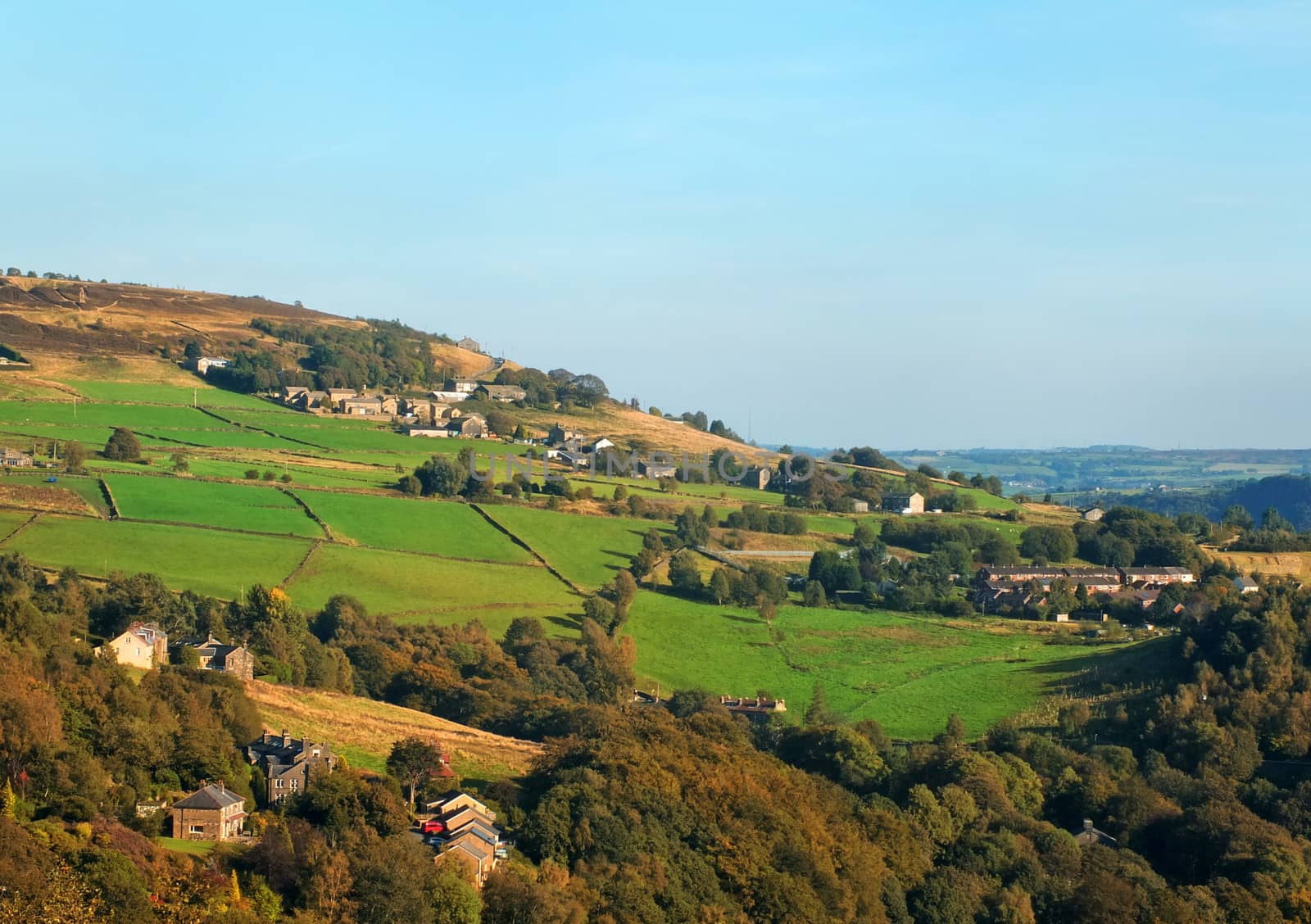 the village of wadsworth and surrounding hillside fields in the calder valley west yorkshire