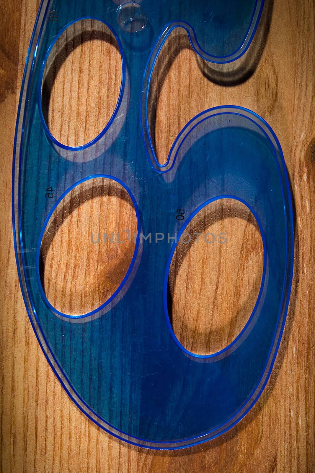 Plastic blue pattern on a wooden table