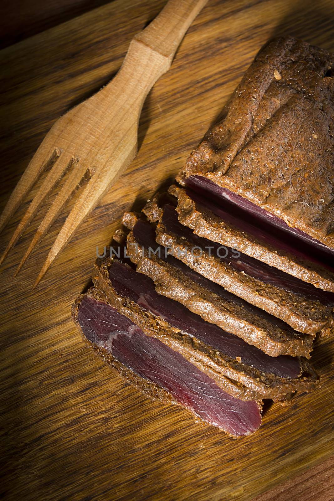 Jerky on a wooden board by VIPDesignUSA