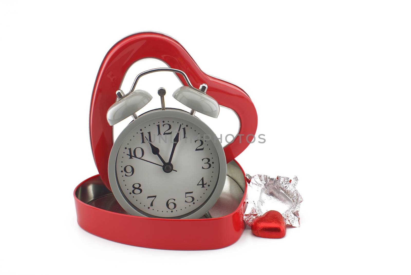 Retro alarm clock in a red heart shaped box by NetPix