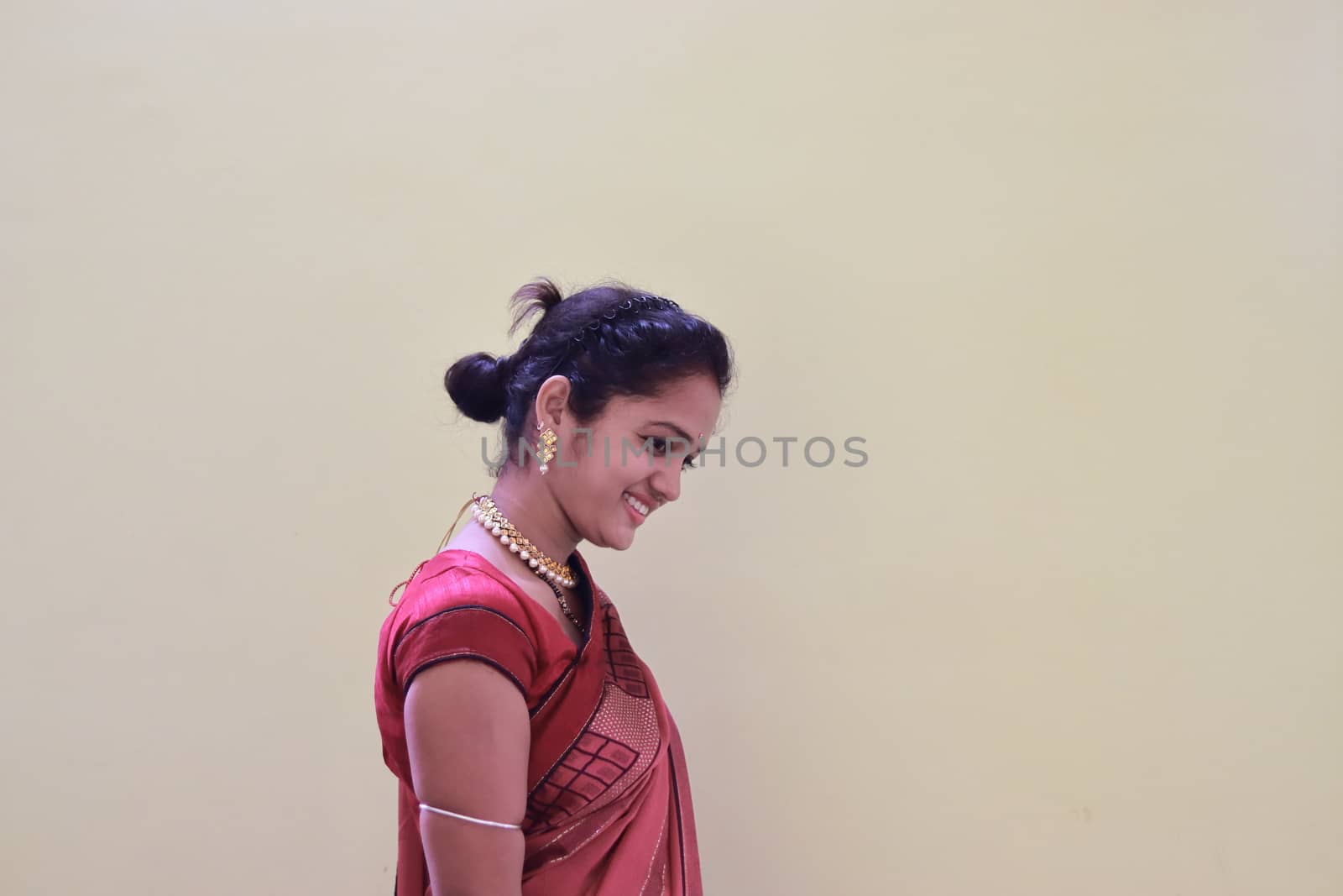 A model woman in a sari dressed in her customs and religion by 9500102400
