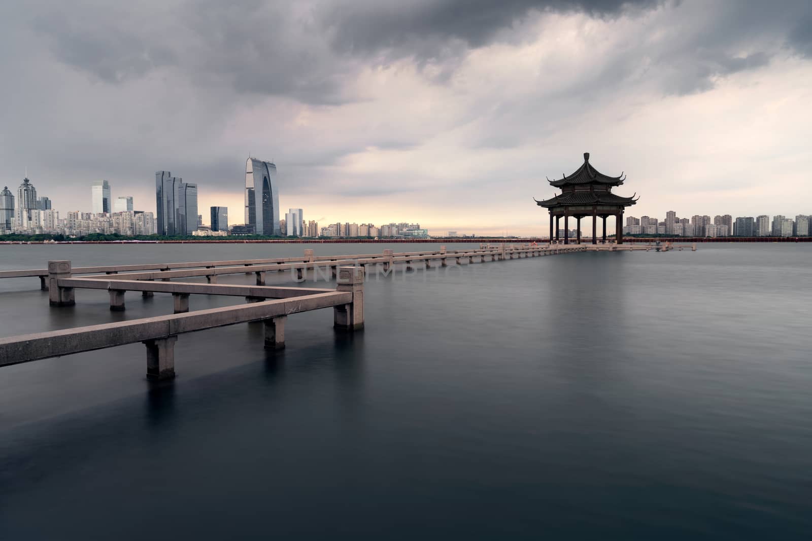 City landscape around the lake. Photo in Suzhou, China.