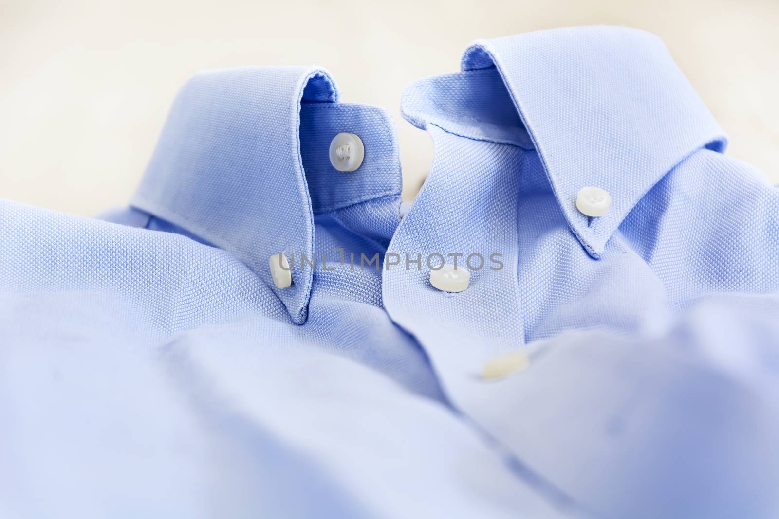 A light blue shirt with a button down collar. by rarrarorro