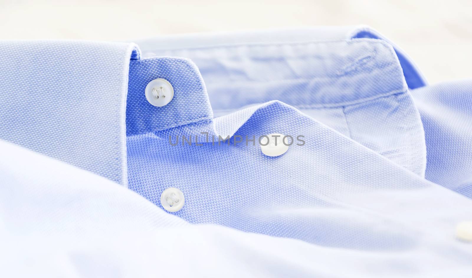 A light blue shirt with a button down collar. by rarrarorro