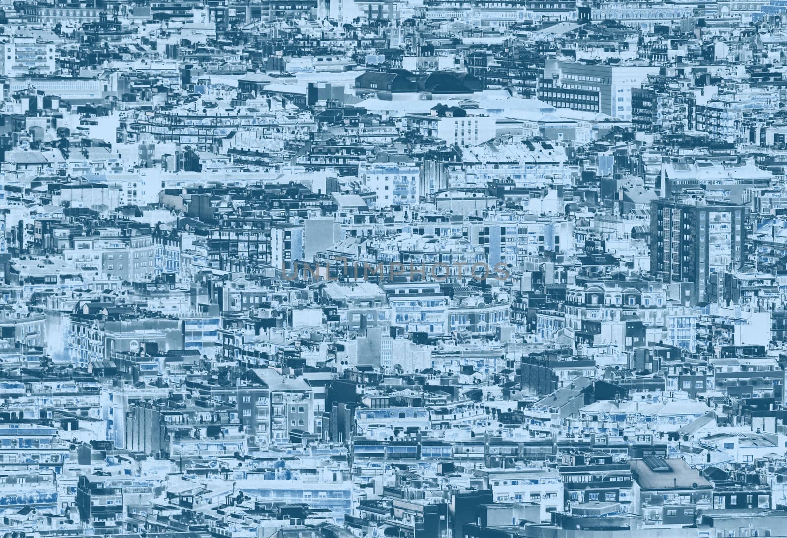 a blue duotone crowded urban cityscape background with hundreds of densely packed buildings