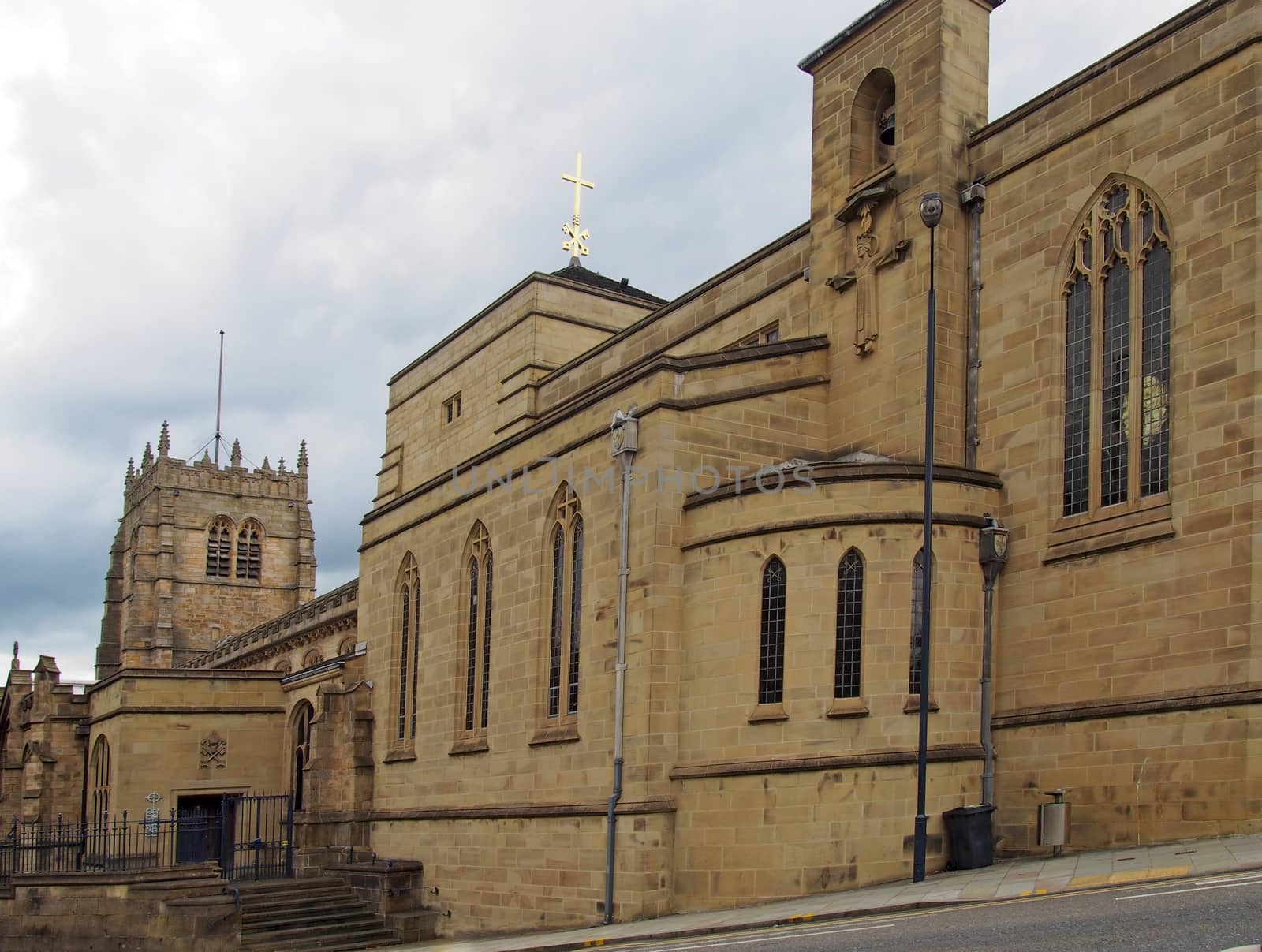 a view of the medieval church of bradford cathedral in west yorkshire with main building and entrance from the street