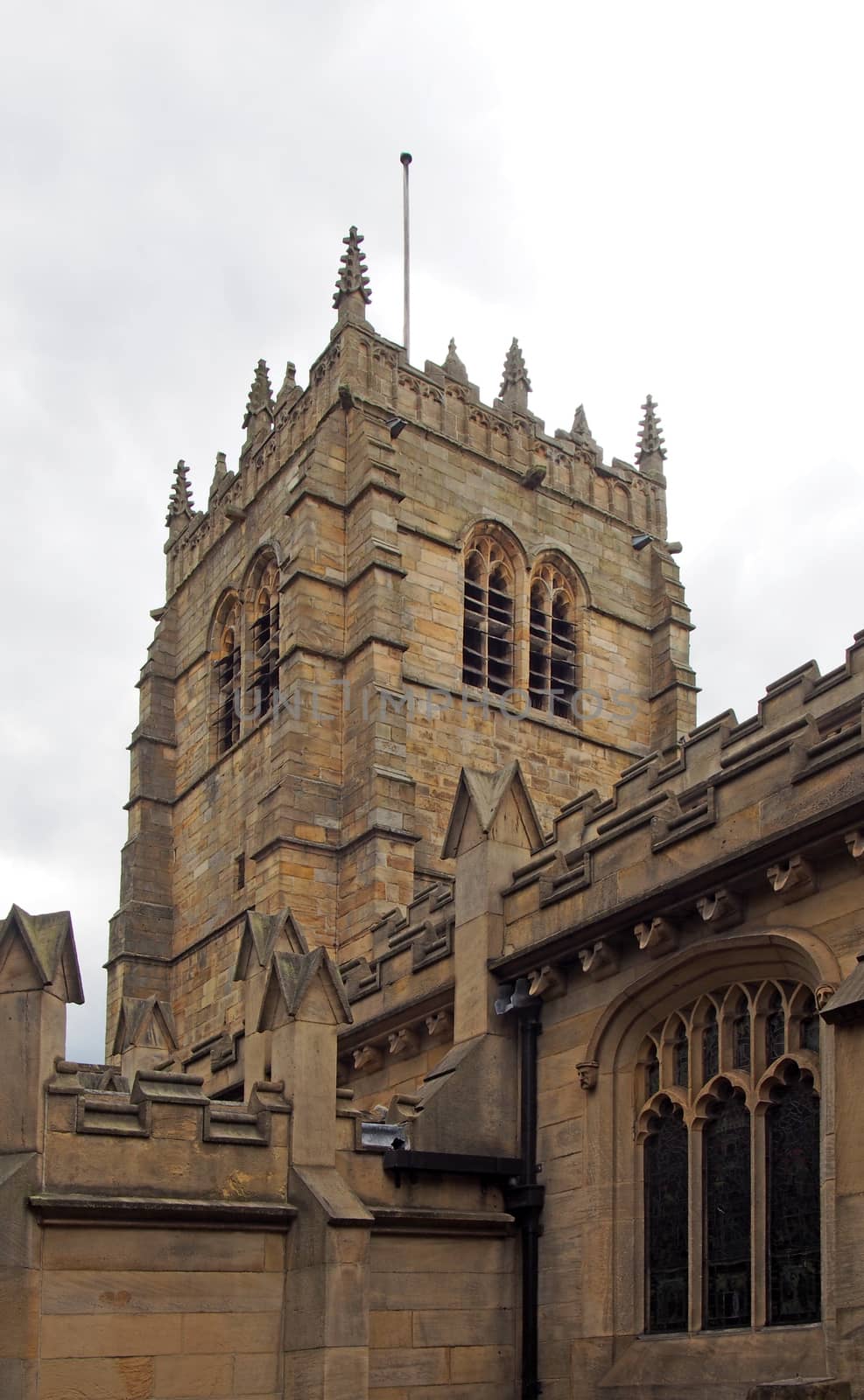 a view of the medieval church of bradford cathedral in west yorkshire the tower and decorative stonework
