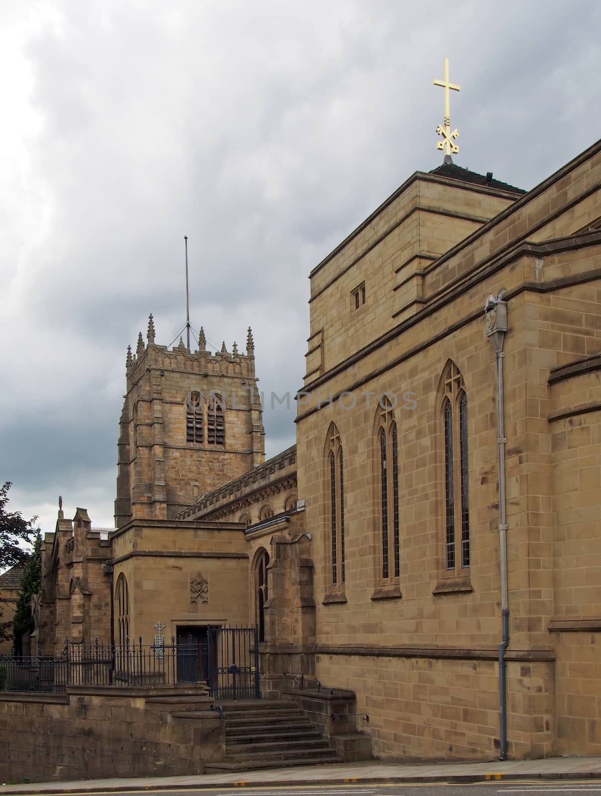 a view of the medieval church of bradford cathedral in west yorkshire with main building and entrance from the street