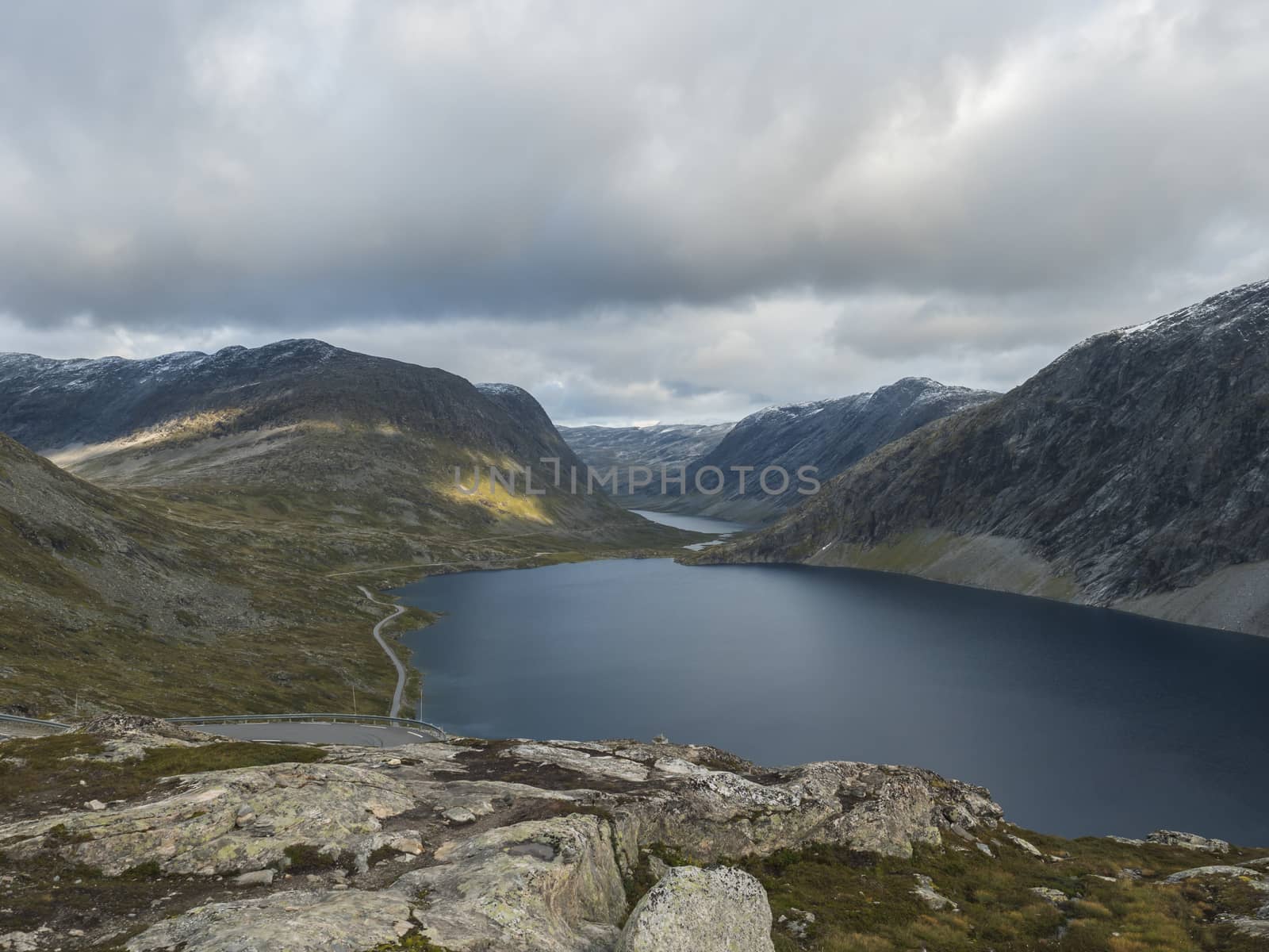 View of the Lake Djupvatnet from raod to mountain Dalsnibba plateaua. Norway, early autumn, cloudy day. Travel Holiday in Norway.