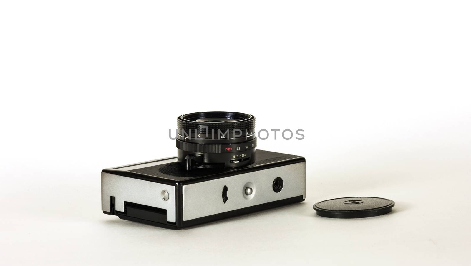 Camera for taking pictures on film on a light background by Grommik