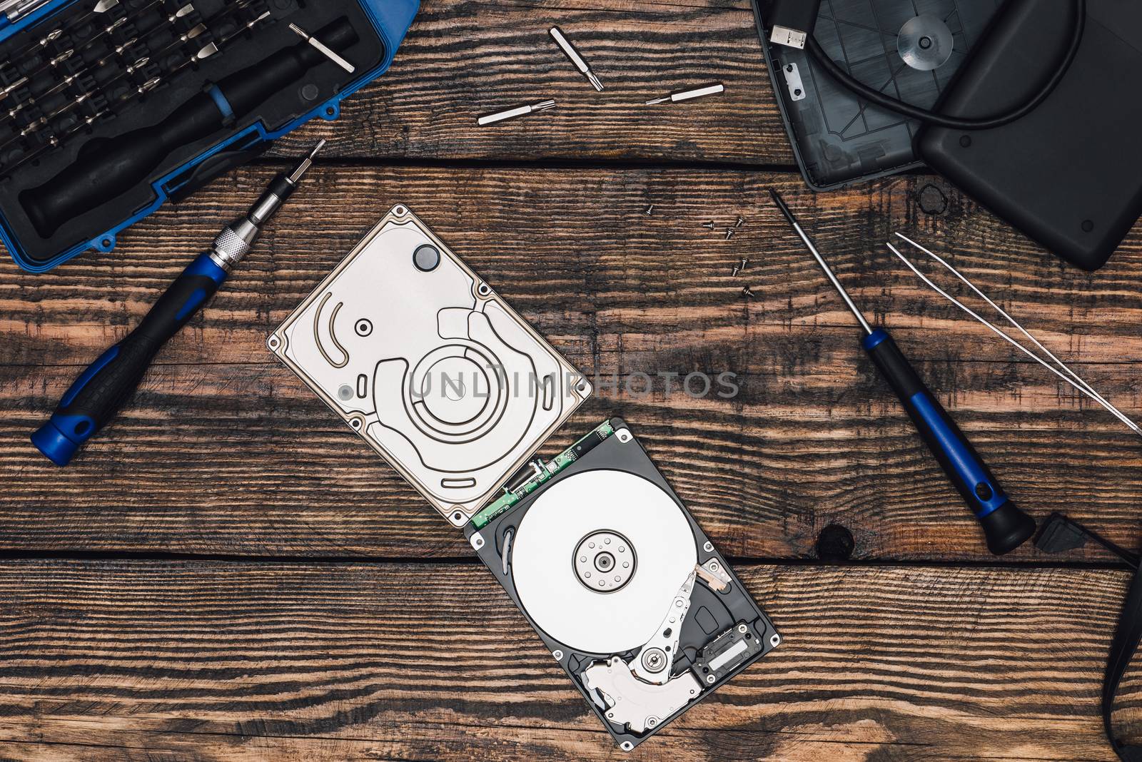 HDD with Screwdriver and Other Tools by Seva_blsv