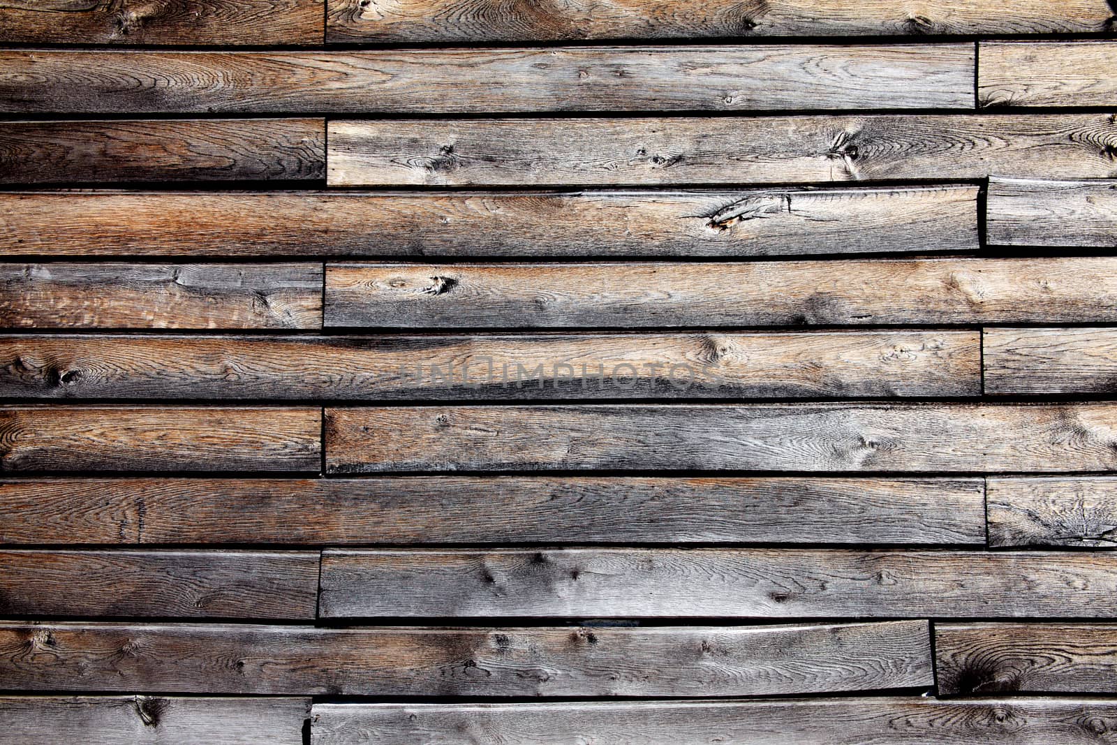 Old brown weathered distressed wood board planks background stock photo