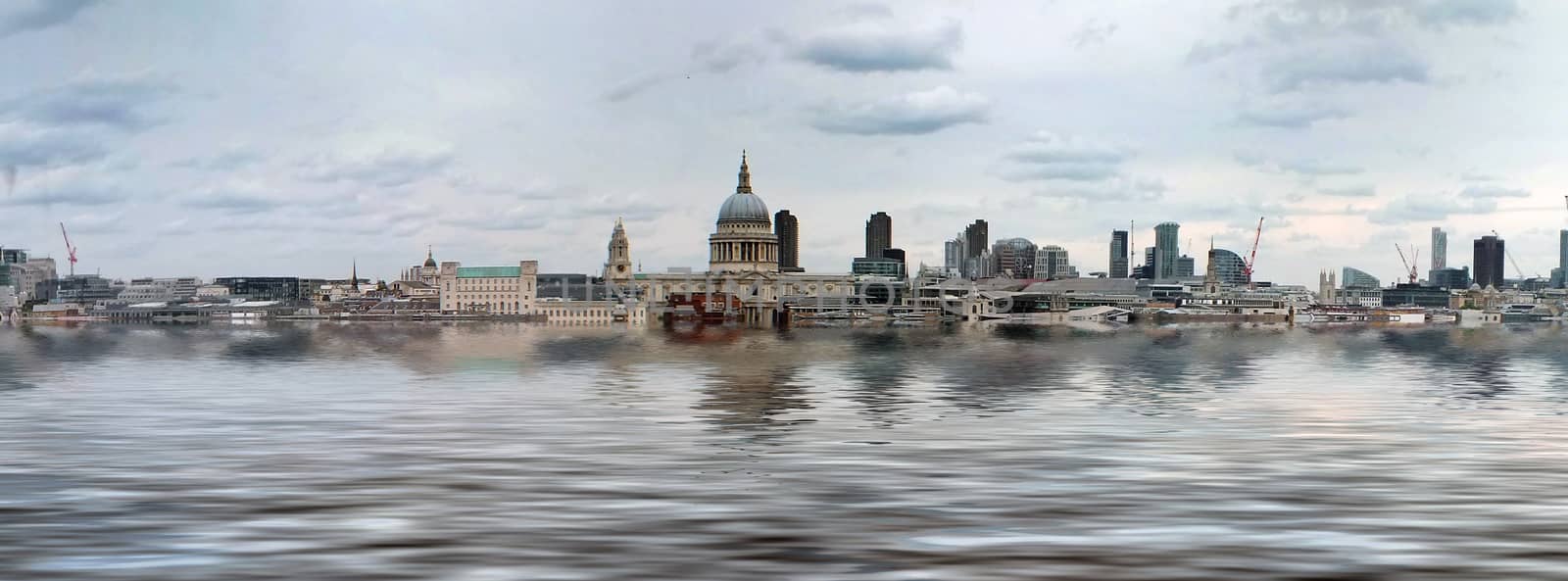 manipulated conceptual image of the city of london with buildings flooded due to global warming and rising sea levels and gulls